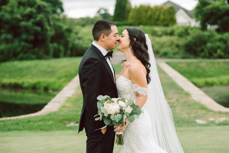 Brianna and Joe perfectly balances each other with their opposite personalities. Brianna quiet and calm and Joe loud and funny, they are the yin and yang to each other and together they create amazing chemistry. Joe's eyes literally sparkles when he is looking at her. Brianna and Joe's summer wedding at Trump National Golf Club Colts Neck NJ this past August was nothing but fun, filled with love and happy tears. Love is all we need in a wedding day! Brianna and Joe got married at ST. Mary’s Church in Colts Neck NJ then partied at Trump National Golf Club Colts Neck NJ. As soon as everyone was inside for the reception, the heavy grey clouds released a down pour washing the humidity away. Leaving cool evening for the newlyweds and their wedding guests to enjoy. Brianna and Joe's wedding at Trump National Golf Club Colts Neck NJ photographed by Karis, NY NJ wedding and elopement photographer Hey Karis.
